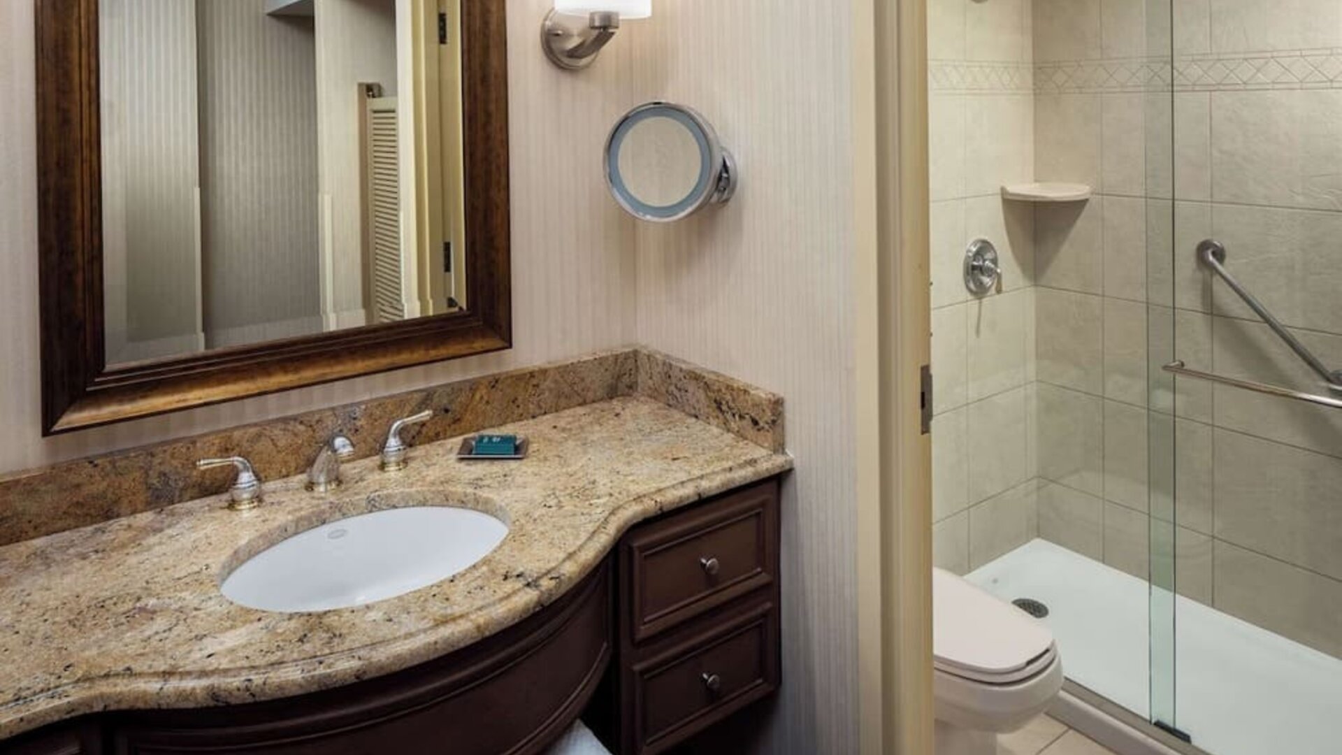 Guest bathroom with shower at Hilton Chicago-Northbrook.