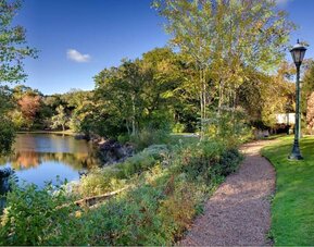 Trail by the river at Hilton Chicago-Northbrook.
