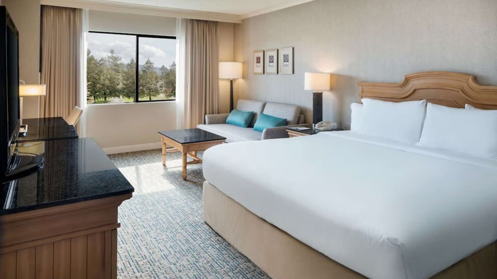 Day use room with work desk and sofa at DoubleTree By Hilton Sonoma Wine Country.