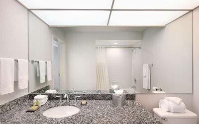 Guest bathroom with shower at DoubleTree By Hilton Sonoma Wine Country.