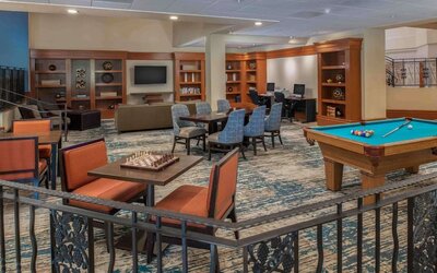 Game room with chess and billiards table at DoubleTree By Hilton Sonoma Wine Country.