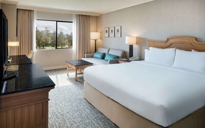 Day use room with work desk and sofa at DoubleTree By Hilton Sonoma Wine Country.