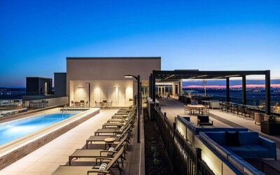 Beautiful rooftop with swimming pool and lounge area at Hilton BNA Nashville Airport Terminal.
