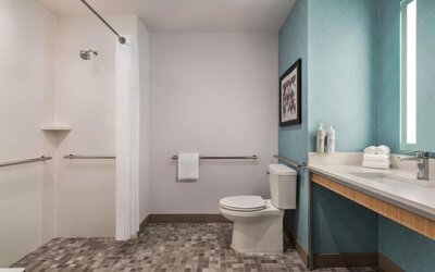 Private guest bathroom with shower at Hilton Garden Inn Nashville West End Avenue.