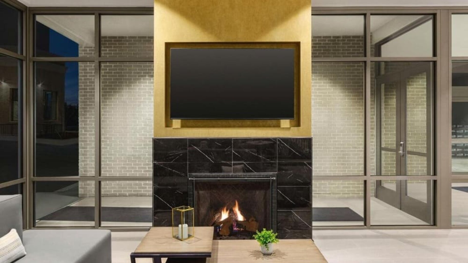 Lobby lounge with fireplace at Hilton Garden Inn Nashville West End Avenue.