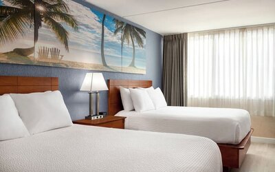 Bright and spacious day use twin room at EnVision Hotel Miami International Airport.