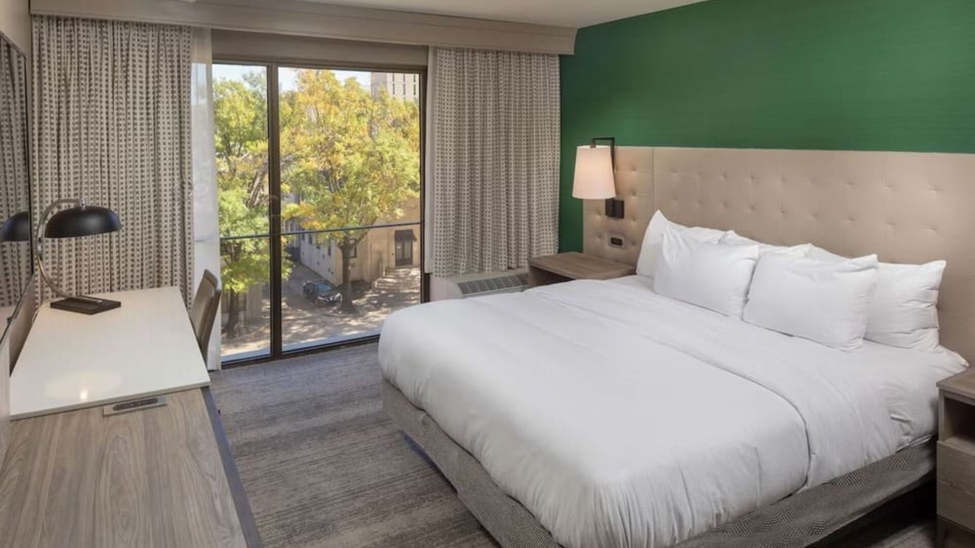 Day use room with work desk and natural light at Hilton Birmingham At UAB.