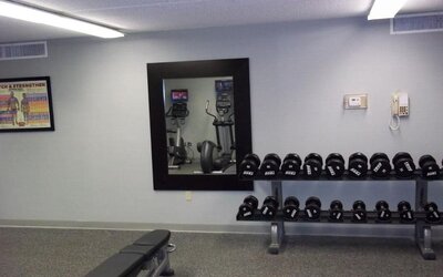 Fitness center at EnVision Hotel And Conference Center Mansfield Foxboro.