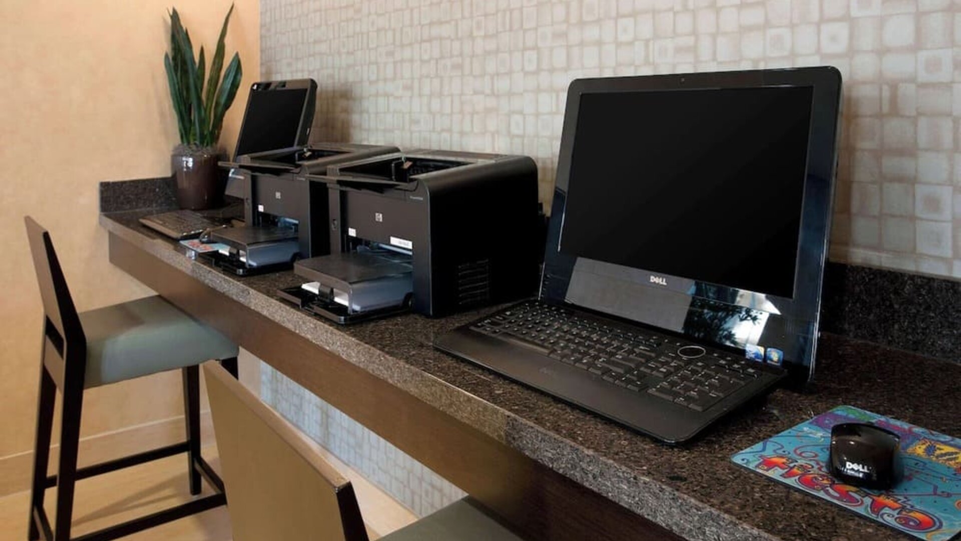 Business center with computers and printer at Sonesta ES Suites San Antonio Downtown Alamo Plaza.