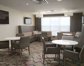 Dining area at Sonesta ES Suites Fort Worth Fossil Creek.