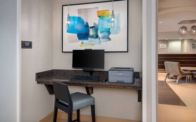 Business center with computer and printer at Sonesta ES Suites Atlanta Alpharetta North Point Mall.