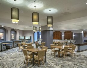 Dining area perfect for coworking at DoubleTree By Hilton Modesto.