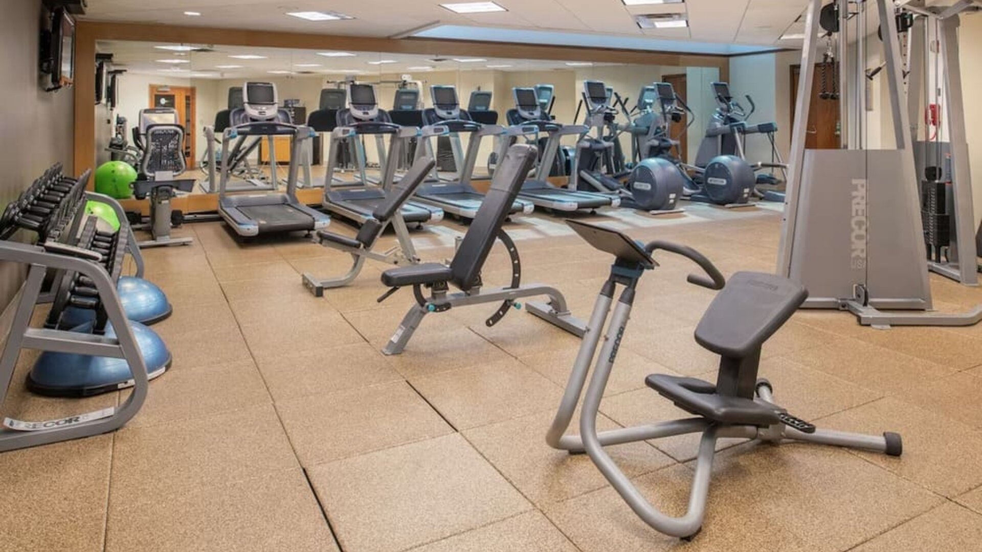 Fully equipped fitness center at Hilton Bellevue.