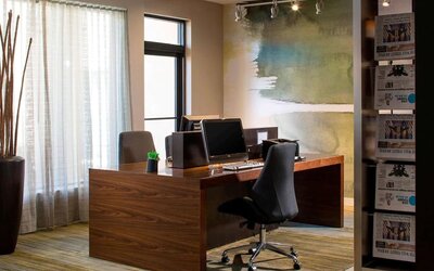 Business center with computers, printer and ergonomic chairs at Sonesta Select Boca Raton.