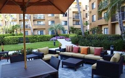 Outdoor lounge seating area at Sonesta Select Boca Raton.