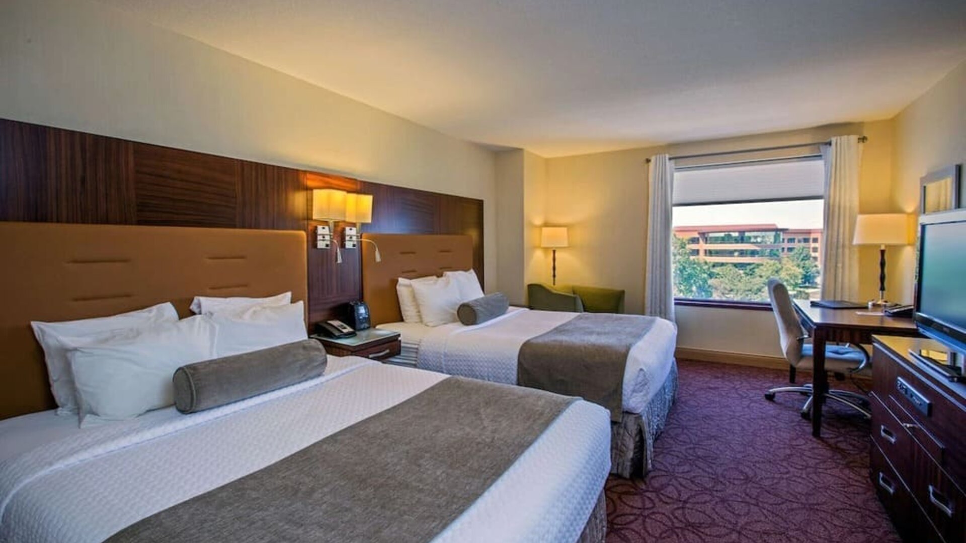 Bright and spacious day use twin room with work desk at Sonesta Milwaukee West Wauwatosa.