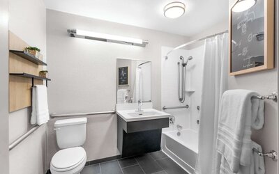 Private guest bathroom at Sonesta Simply Suites Austin South.