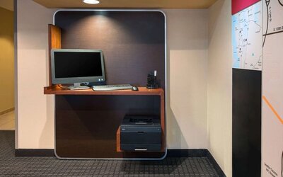 Business center with computer and printer at Sonesta Simply Suites Seattle Renton.