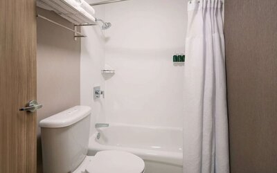 Private guest bathroom with shower at Sonesta Select Seattle Renton.