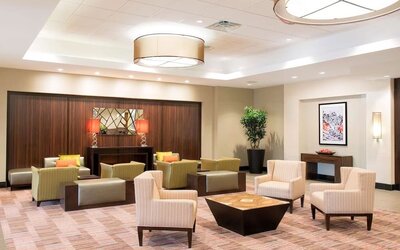 Lobby and coworking lounge at DoubleTree By Hilton Grand Rapids Airport.