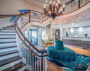 Lobby and coworking lounge at Hampton Inn & Suites Amelia Island-Historic Harbor Front.