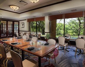 Dining area with a beautiful view perfect for coworking at DoubleTree By Hilton Lisle-Naperville.