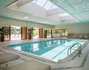 Relaxing indoor pool at DoubleTree By Hilton Lisle-Naperville.