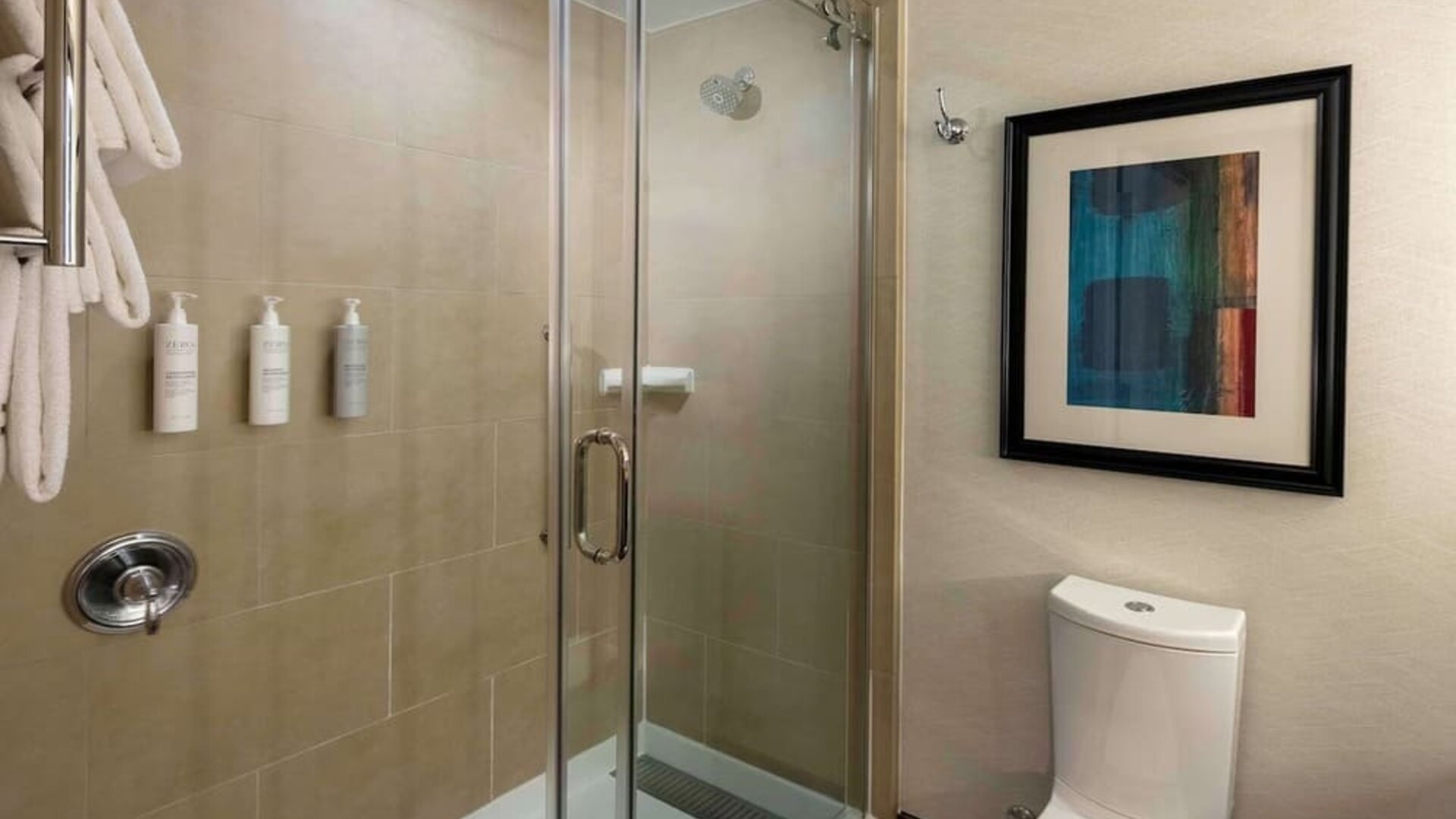 Guest bathroom with shower at Hilton Garden Inn Washington DC/Georgetown Area.