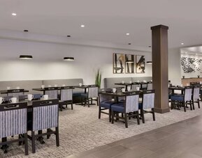 Breakfast area perfect for coworking at DoubleTree By Hilton Canton Downtown.