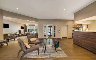 Lobby lounge with convenience store at Sonesta ES Suites Parsippany Morris Plains.