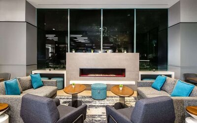 Lobby lounge with fireplace at Sonesta Columbus Downtown.
