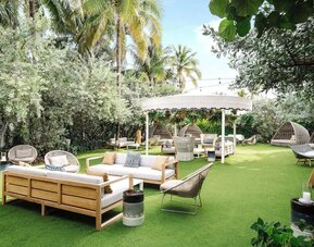 Patio lounge at Nautilus Sonesta Miami Beach.