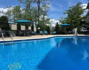 Refreshing outdoor pool at Hampton Inn Bloomington.