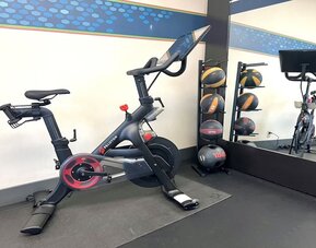 Peloton bike available in the fitness center of Hampton Inn Bloomington.