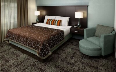 King bed at Sonesta ES Suites Atlanta Alpharetta Avalon.