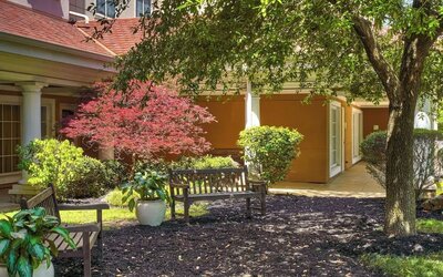 Hotel patio with lounge seating at Sonesta Atlanta Airport South.