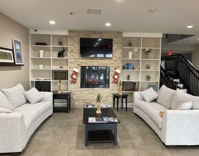 Lobby lounge at Country Inn & Suites By Radisson, Chicago O'Hare South.