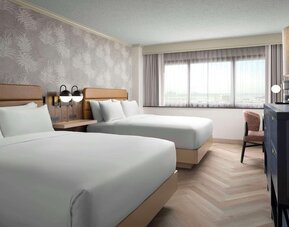 Day use twin room with work desk and natural light at Sonesta Los Angeles Airport LAX.