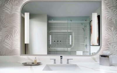 Private guest bathroom with shower at Sonesta Los Angeles Airport LAX.