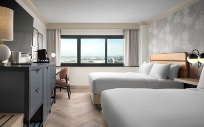 Bright and spacious day use twin room with work desk and private bathroom at Sonesta Los Angeles Airport LAX.