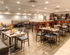 Dining area and workspace, perfect for coworking at Holiday Inn Belcamp - Aberdeen Area.