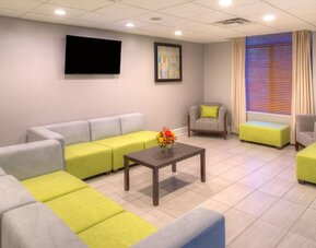 Comfortable lobby lounge at Holiday Inn Belcamp - Aberdeen Area.