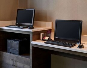 Business center with computers and printer at Sonesta ES Suites Chicago Downtown Magnificent Mile - Medical.