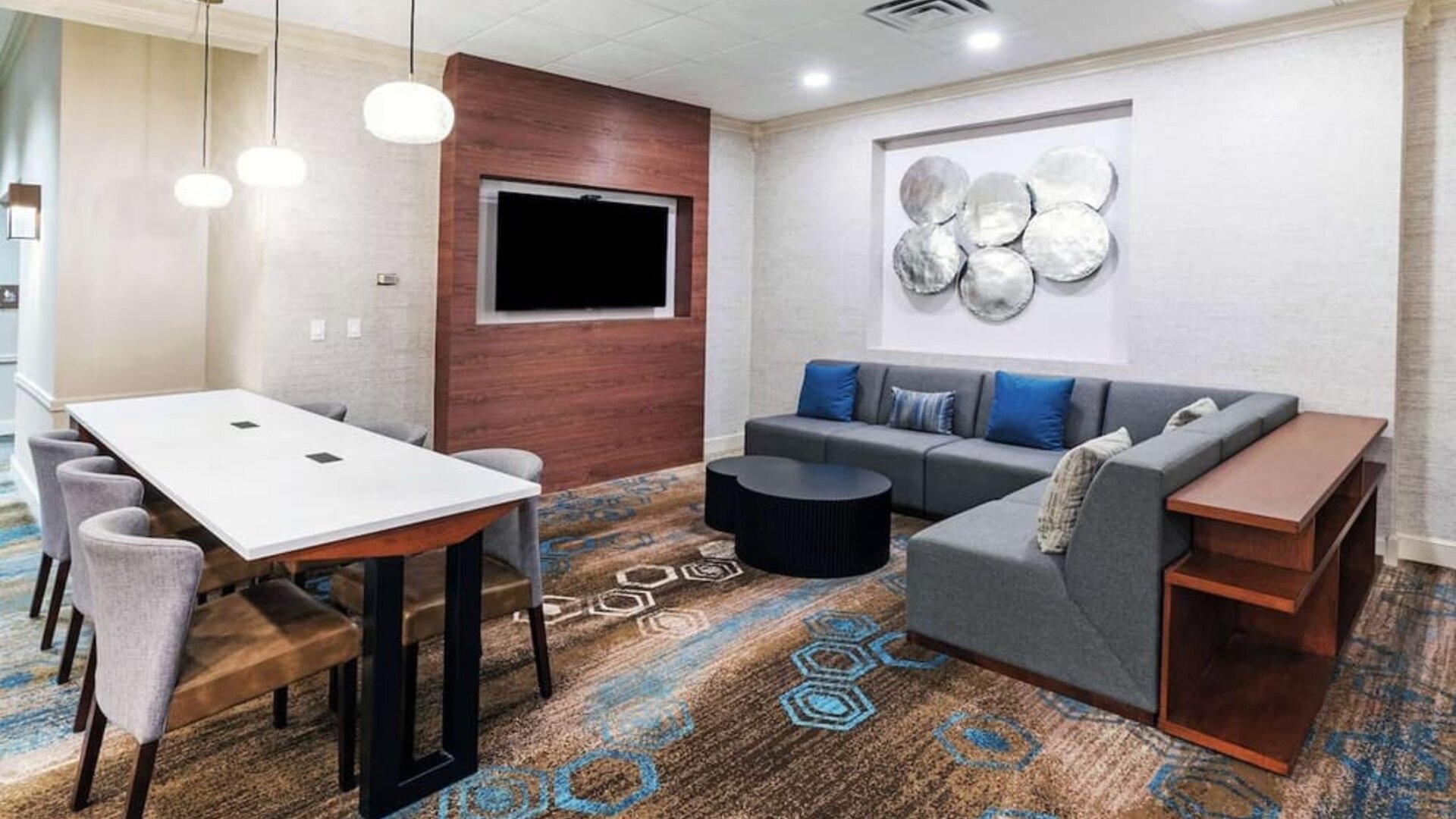 Lobby and coworking lounge at DoubleTree By Hilton Tulsa-Downtown.

