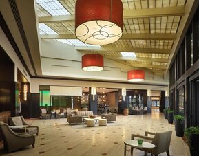 Lobby and coworking lounge at Hilton Rosemont/Chicago O'Hare.