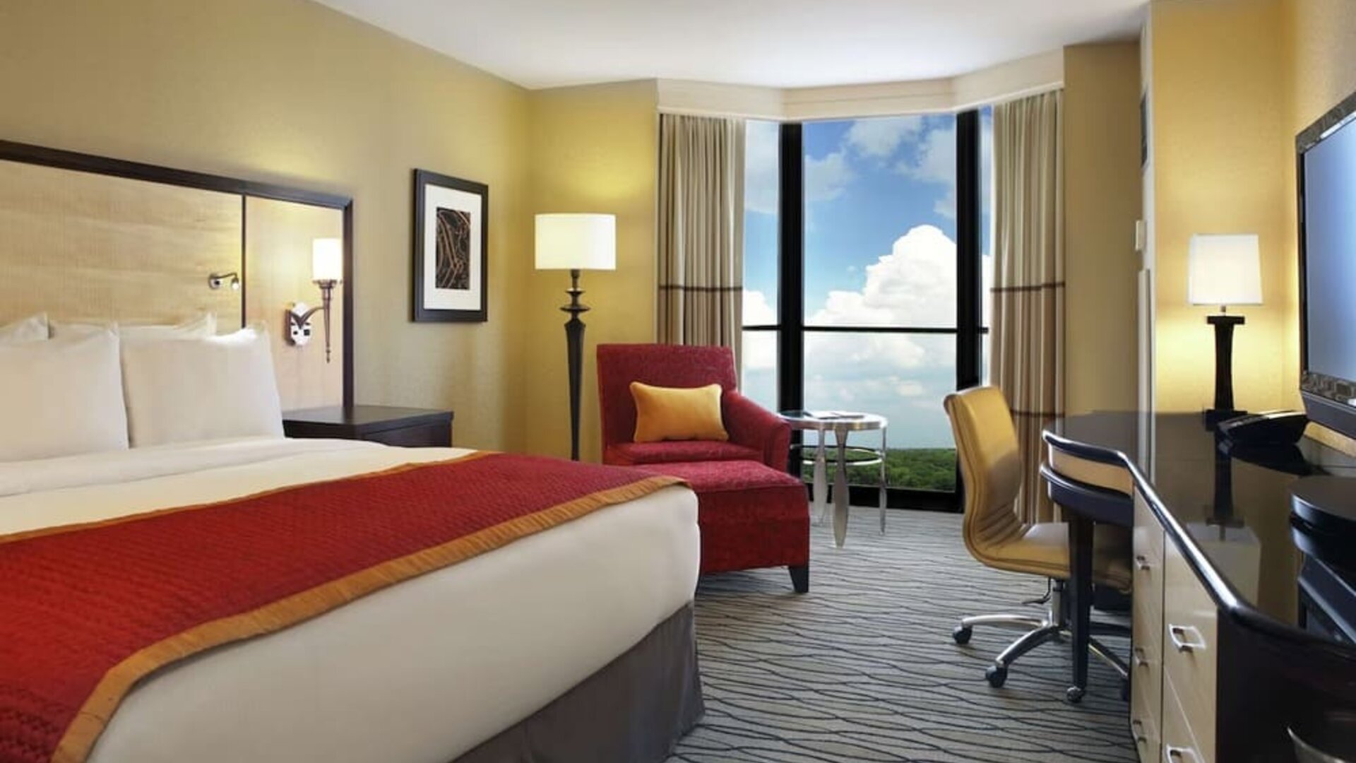 Beautiful king suite with TV, work desk and a lovely view at Hilton Rosemont/Chicago O'Hare.