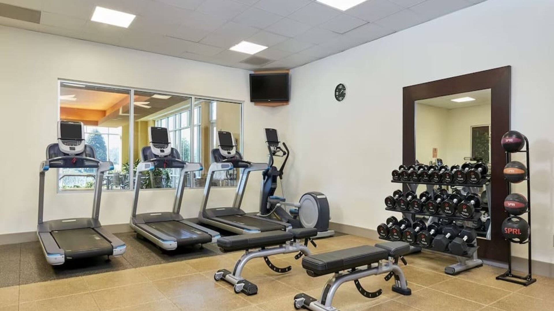 Fitness center at Embassy Suites By Hilton Hampton Convention Center.