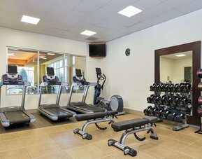 Fitness center at Embassy Suites By Hilton Hampton Convention Center.