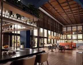 Dining area with natural light perfect for coworking at Hotel Fera Anaheim, A DoubleTree By Hilton.