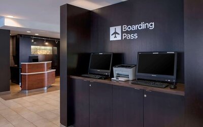 Business center with computers and printer at Sonesta Select Boston Milford.